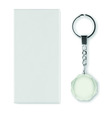 Logotrade reklamprodukter bild: Rund nyckelring i glas